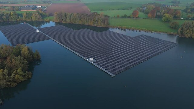 Photovoltaic Plants On The Water Of Holemans - Kieswerk Ellerdonk In Wesel, Germany. Aerial Drone Shot
