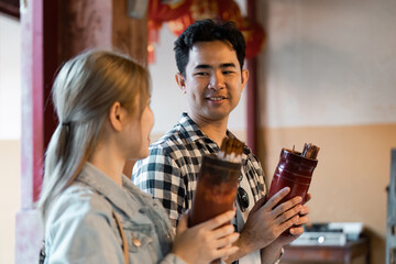 Cultural travel experience engaging conversations in a local market city indoor personal connection