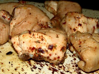 Slices of cooked meat on a plate background