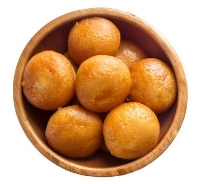 sweets Badusha (Balushahi) in a wooden bowl isolated on top view. isolated on a transparent background, top view, PNG."
