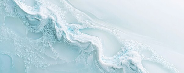 Naklejka premium Closeup of an ice surface with intricate patterns and textures. Light blue background backdrop
