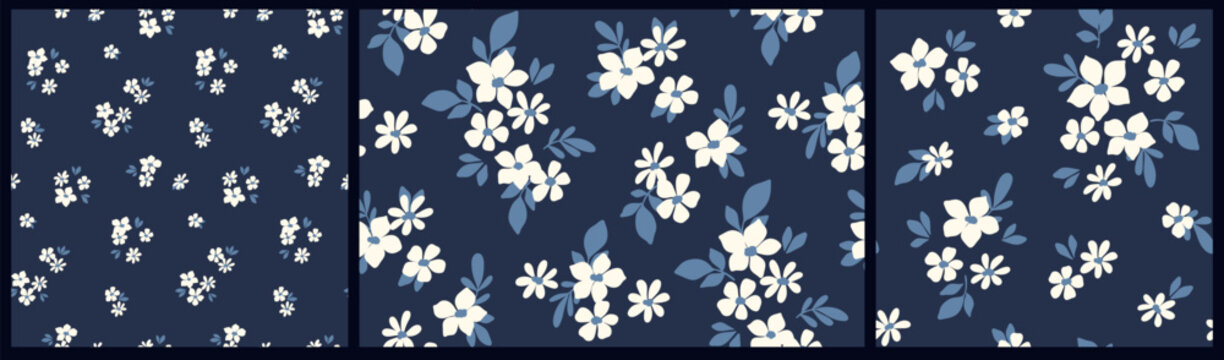 Seamless floral pattern, liberty ditsy print with small white flowers on a dark blue field. Cute botanical design: simple hand drawn plants, tiny flowers, leaves in mini bouquets. Vector illustration.