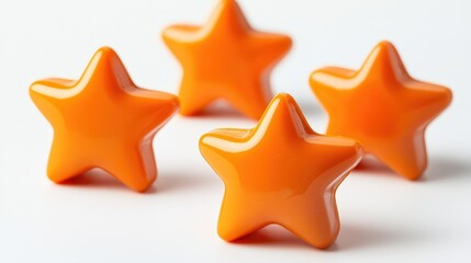 Obraz premium Bright orange stars casting shadows on a clean white surface during daylight