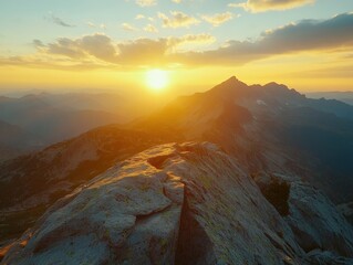 stunning sunset over mountain peaks with dramatic clouds