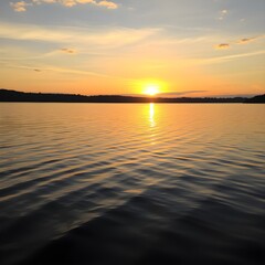 Obraz premium A Calm Lake Reflecting the Golden Hues of Sunset