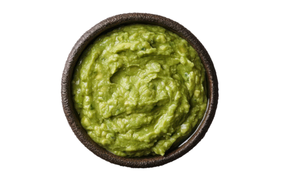Bowl with guacamole isolated on white background, top view