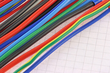 Copper electrical installation wires in colored insulation. Close-up. Soft focus.