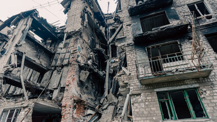 destroyed and burned houses in the city in Ukraine