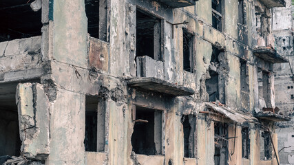 destroyed and burned houses in the city in Ukraine