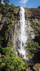 Fototapeta premium The view of a waterfall in Central Highlands of Sri Lanka