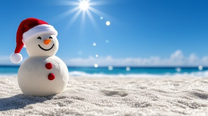 Snowman wearing a Santa hat on a sunny beach with ocean in the background during holiday season