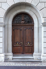 Wood snail carving on top of door