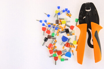 Copper pin colored insulated tips. Close-up. Soft focus.