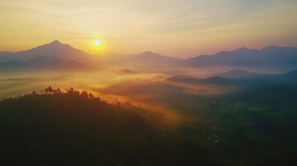 breathtaking sunrise over misty mountains
