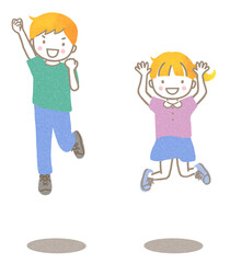 ジャンプしている男の子と女の子