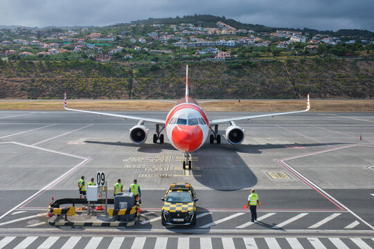 Lisbon, Portugal - September 2, 2023: Condor Airbus A321-211 passenger plane parked near runway in Cristiano Ronaldo Airport on Madeira island