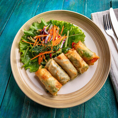 Crispy Vegetable Spring Rolls with Fresh Salad and Lettuce