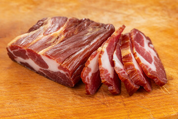 jerky meat isolated on wooden desk