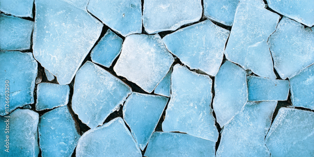 Poster a textured surface of blue, fragmented stones arranged closely, creating a visually striking mosaic 