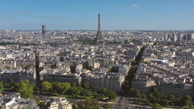 PARIS, FRANCE - OCTOBER 3, 2024: Aerial view of Paris showcasing iconic landmarks and vibrant city life under clear skies