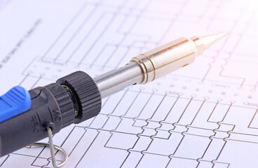 A low-voltage electric soldering iron for soldering components on a printed circuit board. Soft...