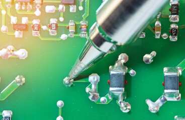 A low-voltage electric soldering iron for soldering components on a printed circuit board. Soft...