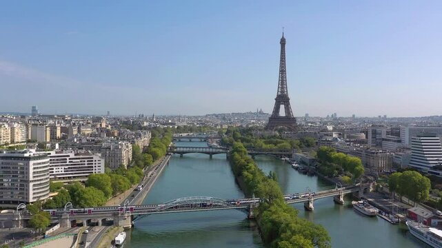 PARIS, FRANCE - OCTOBER 3, 2024: Aerial view of the Eiffel Tower and Seine River showcasing the beauty of Paris in autumn