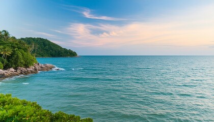 Blue Sea and Pink Sky: A Captivating Display of Natureâ€™s Beauty - Experience the Serenity of Coastal Landscapes and Vibrant Sunsets in This Stunning Photograph