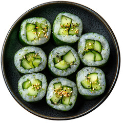 Top view of cucumber avocado rolls on a dark ceramic plate isolated on a white transparent background