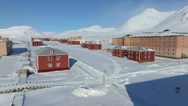 Pyramiden Town in Spitsbergen, Svalbard and Jan Mayen under heavy snow, Aerial view