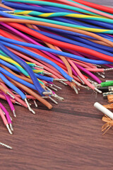 Copper electrical installation wires in colored insulation. Close-up. Soft focus.