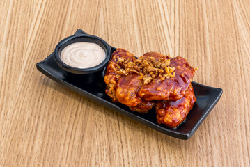 BBQ chicken wings are crispy on the outside, juicy on the inside, and have a smoky, sweet flavor that makes them irresistible