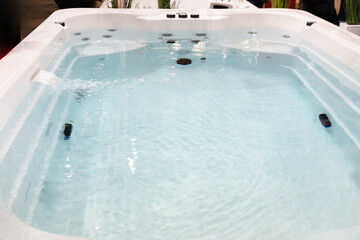 cascading high pressure clear water jet in individual bath .