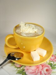 A cup of coffee on a table close view background