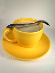 A cup of coffee on a table close view background