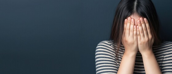 Emotional struggle of a young woman indoor setting portrait intimate environment close-up mental health awareness