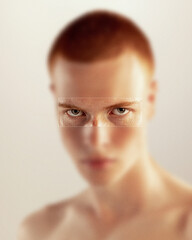 Contemporary art collage. Male face with a focused gaze, highlights the eyes in sharp clarity,...