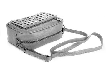 Deep gray leather purse handbag with grey rivets isolated white background. Gray bag fashion. White bags woman fashion. Black style