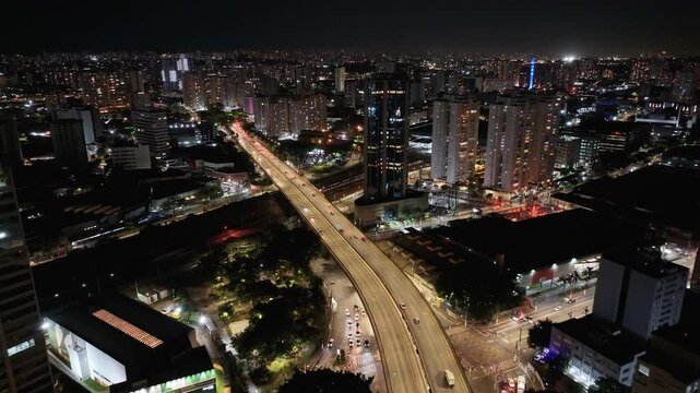 Sao Paulo Skyline At Sao Paulo In Brazil. Traffic Avenue. Downtown District. City Night Landscape. Sao Paulo Skyline At Sao Paulo In Brazil. Cityscape Background.