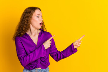 Photo portrait of attractive young woman point look scared empty space dressed stylish violet...