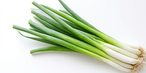 Green onion displayed in isolation on a white background. A top view flat lay showcasing the vibrant green onion, highlighting its fresh appearance and unique texture for culinary use.