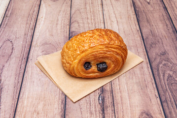 The Neapolitan is a famous pastry product and a type of bun, belonging to the bakery. It is a chocolate or custard filling wrapped in a puff pastry