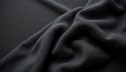 Black fabric texture with soft folds for product design and background