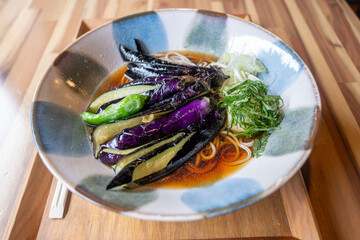 Ginzan onsen, Yamagata, Japan, Delicious bowl of noodles with egg plant.