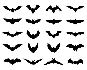 Big set of black silhouettes of bats on a white background