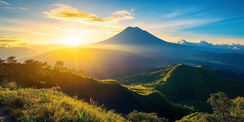 Obraz premium Ungaran Mountain shines beautifully under the sun, showcasing its stunning landscapes. The beauty of Ungaran Mountain is particularly captivating on sunny days, making it a perfect view to enjoy.