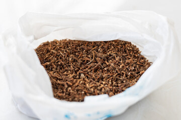 Dried folded earbuds in a bag