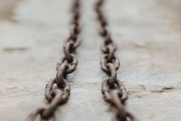 Close-Up of Bound Hands Holding Metal Chains, Symbolizing Oppression and Resilience