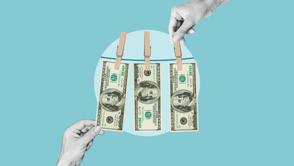 Tax fraud and Money Laundering are shown with dried dollars from clothesline. Financial money...