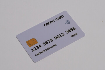 White credit card isolated on white background.